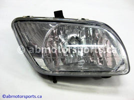 Used Honda ATV TRX 350 FM OEM part # 33110-HN5-M40 right head light for sale 