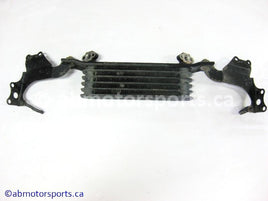 Used Honda ATV TRX 350 FM OEM part # 15600-HM7-610 OR 15600HM7610 oil cooler for sale

