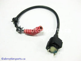 Used Honda ATV TRX 350 FM OEM part # 30510-HN5-670 OR 30510HN5670 or 30510-KJ2-405 OR 30510KJ2405 ignition coil for sale