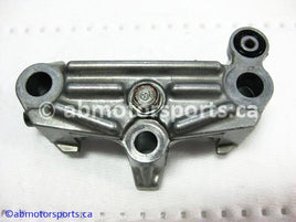 Used Honda ATV TRX 350 FM OEM part # 14411-HN5-670 OR 14411HN5670 rocker arm holder for sale 
