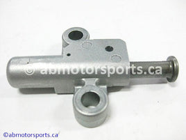 Used Honda ATV TRX 350 FM OEM part # 14540-HN5-671 OR 14540HN5671 cam chain tensioner for sale 
