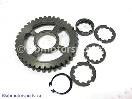 Used Honda ATV TRX 350 FM OEM part # 23411-HN5-670 OR 23411HN5670 low countershaft gear for sale 
