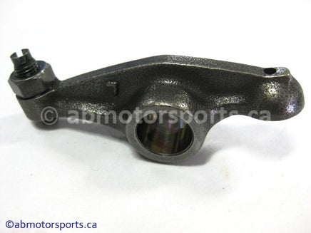 Used Honda ATV TRX 350 FM OEM part # 14431-HM8-000 OR 14431HM8000 rocker arm valve for sale 
