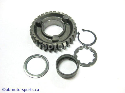 Used Honda ATV TRX 350 FM OEM part # 23461-HN5-670 OR 23461HN5670 main shaft fourth gear for sale 
