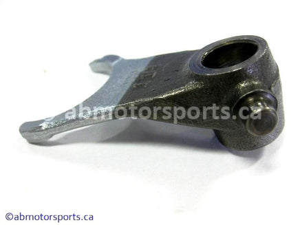 Used Honda ATV TRX 350 FM OEM part # 24212-HN5-670 OR 24212HN5670 center gear shift fork for sale 
