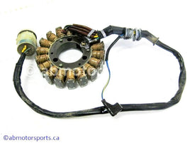 Used Honda ATV TRX 350 FM OEM part # 31120-HN5-M02 OR 31120HN5M02 or 31120-HN5-672 OR 31120HN5672 stator for sale