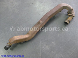 Used Honda ATV TRX 350 FM OEM part # 18320-HN5-670 OR 18320HN5670 exhaust pipe for sale 
