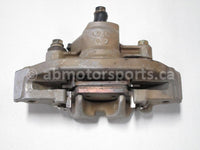 Used 2006 Honda TRX 500 FM ATV OEM part # 45150-HP0-A01 front left brake caliper for sale