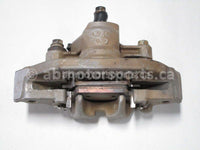 Used 2006 Honda TRX 500 FM ATV OEM part # 45150-HP0-A01 front left brake caliper for sale