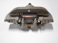 Used 2006 Honda TRX 500 FM ATV OEM part # 45150-HP0-A01 front left brake caliper for sale
