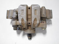 Used 2006 Honda TRX 500 FM ATV OEM part # 45150-HP0-A01 front left brake caliper for sale
