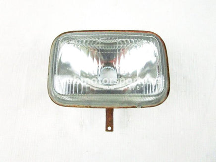 A used Headlight from a 1991 TRX300FW Honda OEM Part # 33120-HC4-000 for sale. Honda ATV parts… Shop our online catalog… Alberta Canada!