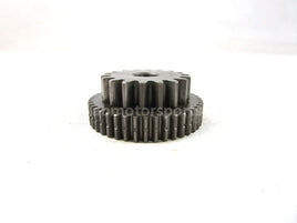 A used Starter Reduction Gear 43T 18T from a 2001 TRX450ES Honda OEM Part # 28140-HN0-A00 for sale. Honda ATV parts online? Shop our online catalog!!