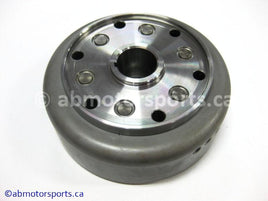 Used Honda ATV TRX 400 FW OEM part # 31110-HM7-004 or 31110HM7004 flywheel rotor for sale