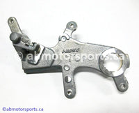 New Honda Dirt Bike CRF 450R OEM part # 43190-KZ4-J41 OR 43190KZ4J41 rear brake caliper bracket for sale
