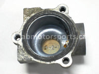 Used Kawasaki ATV BRUTE FORCE 750 OEM part # 16160-0067 lower thermostat body for sale