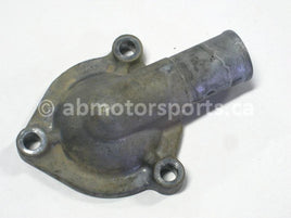Used Kawasaki ATV BRUTE FORCE 750 OEM part # 16160-0046 upper thermostat body for sale
