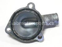 Used Kawasaki ATV BRUTE FORCE 750 OEM part # 16160-0046 upper thermostat body for sale