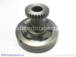 Used Kawasaki ATV KLF 300A OEM part # 13216-1073 clutch housing for sale