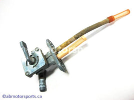 Used Kawasaki Bayou 400 OEM Part # 51023-1159 fuel petcock for sale