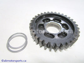 Used Kawasaki Bayou 400 OEM Part # 13260-1216 third output gear for sale