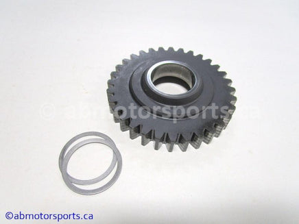 Used Kawasaki Bayou 400 OEM Part # 13260-1216 third output gear for sale