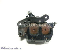 Used Kawasaki Bayou 400 OEM Part # 43041-1519 right front brake caliper for sale