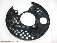 Used Kawasaki Bayou 400 OEM Part # 55020-1304 left disc brake cover for sale