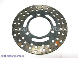 Used Kawasaki Bayou 400 OEM Part # 41080-1216 brake disc for sale