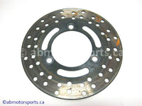 Used Kawasaki Bayou 400 OEM Part # 41080-1216 brake disc for sale