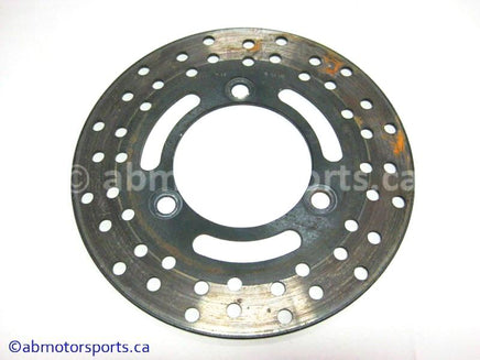 Used Kawasaki Bayou 400 OEM Part # 41080-1216 brake disc for sale