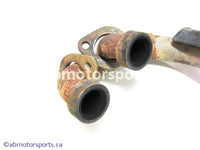 Used Kawasaki Bayou 400 OEM Part # 18049-1580 exhaust pipe for sale