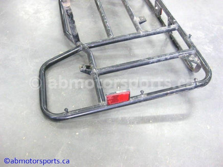 Used Kawasaki Bayou 400 OEM Part # 53028-1075 rear rack for sale