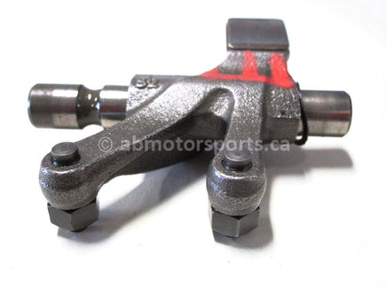 Used Kawasaki ATV BRUTE FORCE 750 OEM part # 12016-1128 exhaust valve rocker arm for sale