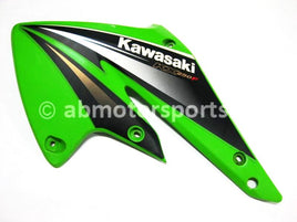 Used Kawasaki Dirt Bike KX 250 F OEM part # 49089-0020-290 left engine panel for sale