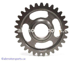 Used Kawasaki Dirt Bike KX 125 OEM part # 59051-1365 idler spur gear for sale