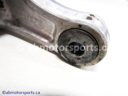 Used Kawasaki Dirt Bike KX 125 OEM part # 39007-1277 rear shock pivot arm for sale