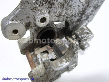 Used Kawasaki Dirt Bike KX 125 OEM part # 43041-1687 rear brake caliper for sale