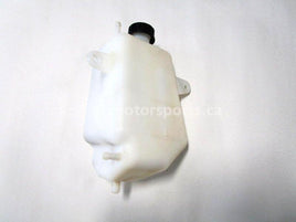 Used 2009 Kawasaki Teryx 750 LE OEM part # 43078-0041 coolant reservoir for sale