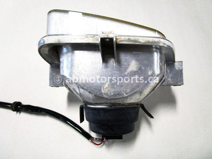 Used 2009 Kawasaki Teryx 750 LE OEM part # 23007-0113 left head light for sale