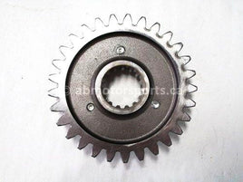 Used 2009 Kawasaki Teryx 750 LE OEM part # 13262-0548 output driven gear for sale