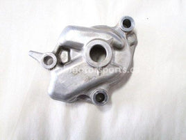 Used 2009 Kawasaki Teryx 750 LE OEM part # 16142-1162 oil pump cover for sale