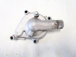 Used 2009 Kawasaki Teryx 750 LE OEM part # 16142-0002 water pump cover for sale