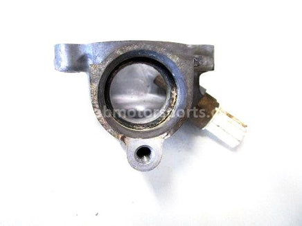 Used 2009 Kawasaki Teryx 750 LE OEM part # 16160-1092 lower thermostat cover for sale