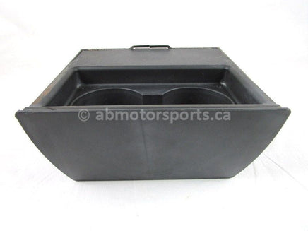 A used Cup Storage Holder from a 2009 TERYX 750LE Kawasaki OEM Part # 39012-0024-6Z for sale. Kawasaki parts near Edmonton? We ship daily across Canada!