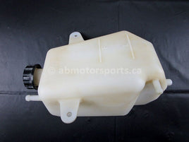 A used Coolant Reservoir from a 2009 TERYX 750LE Kawasaki OEM Part # 43078-0041 for sale. Looking for Kawasaki parts near Edmonton? We ship daily across Canada!