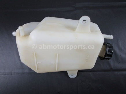 A used Coolant Reservoir from a 2009 TERYX 750LE Kawasaki OEM Part # 43078-0041 for sale. Looking for Kawasaki parts near Edmonton? We ship daily across Canada!
