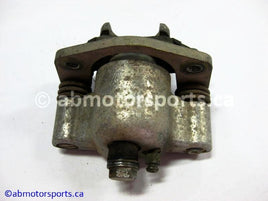 Used Polaris ATV OUTLAW 500 OEM part # 1911048 front left brake caliper for sale 