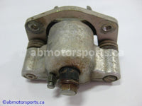 Used Polaris ATV OUTLAW 500 OEM part # 1911049 front right brake caliper for sale 