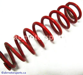 Used Polaris ATV OUTLAW 500 OEM part # 7043133-293 rear shock spring for sale
